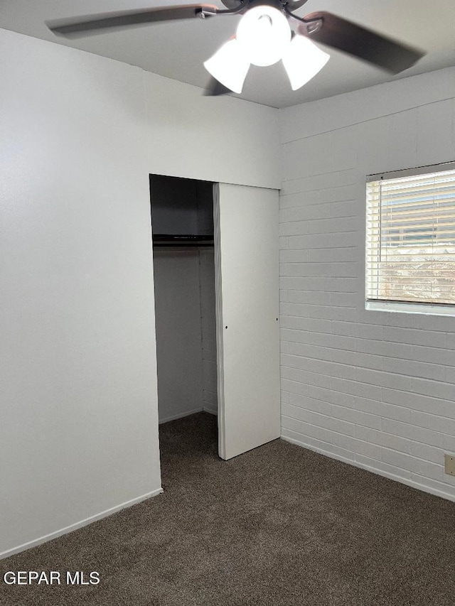 1017 Ralpheene St, El Paso, TX 79907 - unfurnished bedroom with dark carpet, a closet, and ceiling fan