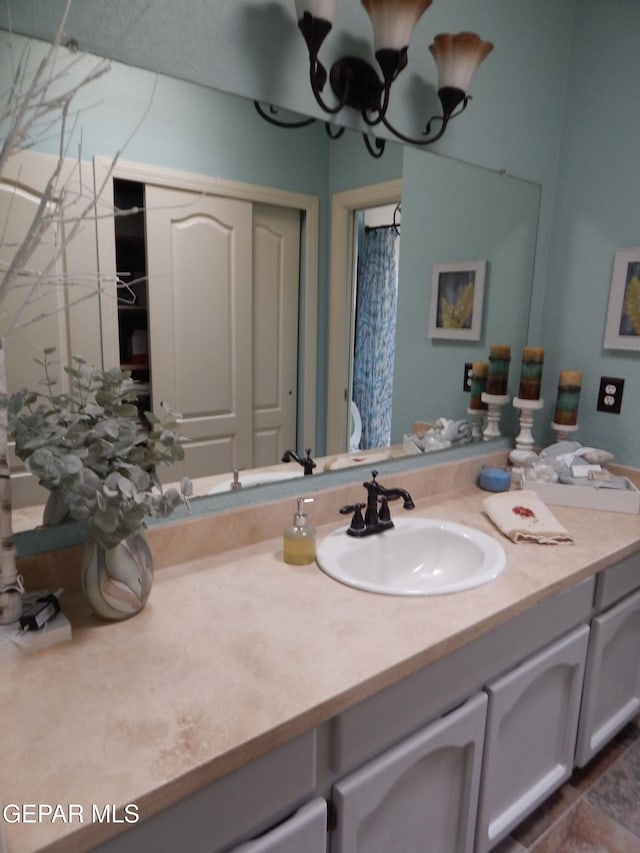 7012 Diamond Ridge Dr, El Paso, TX 79912 - full bath with vanity and a shower with curtain