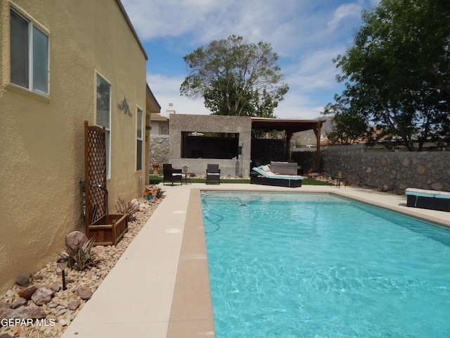 7012 Diamond Ridge Dr, El Paso, TX 79912 - view of pool with a fenced backyard and a patio