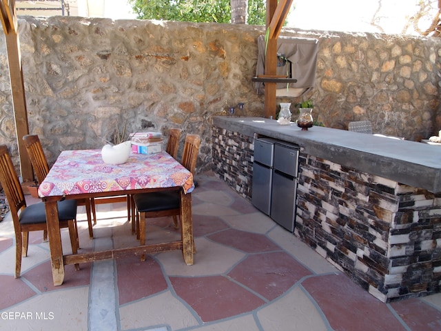7012 Diamond Ridge Dr, El Paso, TX 79912 - view of patio / terrace featuring an outdoor kitchen and outdoor dining space