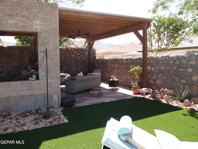 7012 Diamond Ridge Dr, El Paso, TX 79912 - fenced yard with a patio area and ceiling fan