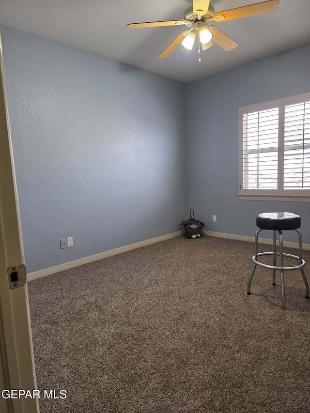 7012 Diamond Ridge Dr, El Paso, TX 79912 - unfurnished room with carpet flooring, baseboards, and a ceiling fan