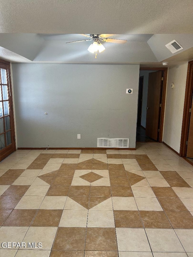 12014 El Greco Cir, El Paso, TX 79936 - empty room with a ceiling fan, a textured ceiling, baseboards, and tile patterned flooring