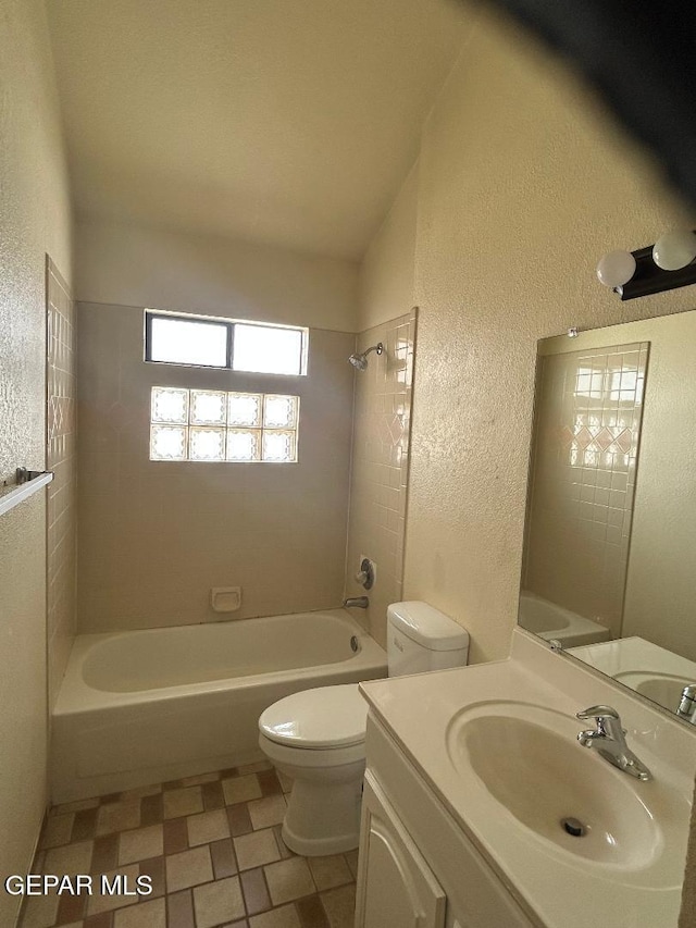 12014 El Greco Cir, El Paso, TX 79936 - full bath featuring toilet, a textured wall, shower / bath combination, and vanity
