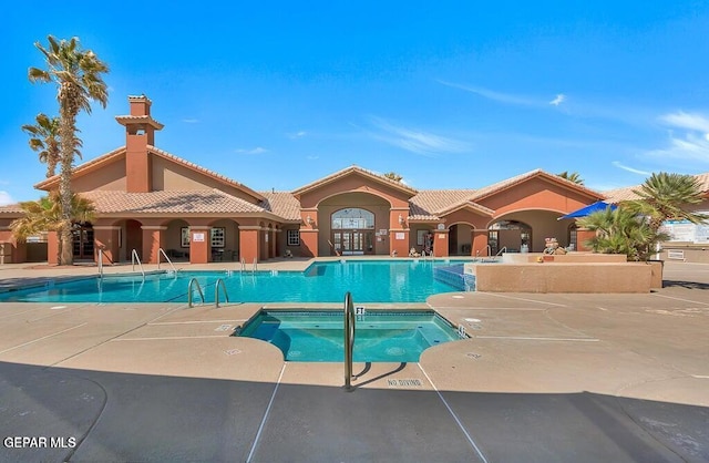11609 Saint Thomas Way, El Paso, TX 79936 - community pool featuring a hot tub and a patio