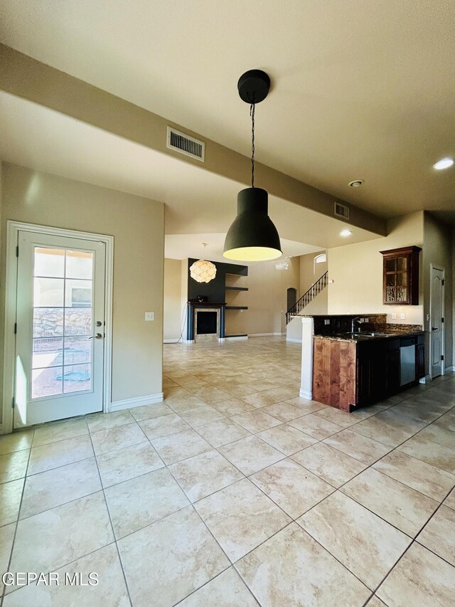 11609 Saint Thomas Way, El Paso, TX 79936 - kitchen with open floor plan, pendant lighting, light tile patterned floors, baseboards, and recessed lighting