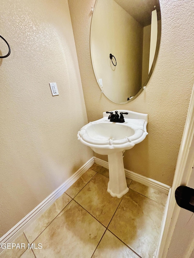 11609 Saint Thomas Way, El Paso, TX 79936 - bathroom featuring tile patterned floors and baseboards