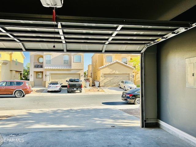 11609 Saint Thomas Way, El Paso, TX 79936 - garage with electric panel and baseboards