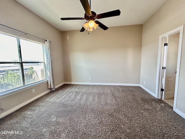 11609 Saint Thomas Way, El Paso, TX 79936 - spare room featuring carpet floors, a ceiling fan, and baseboards
