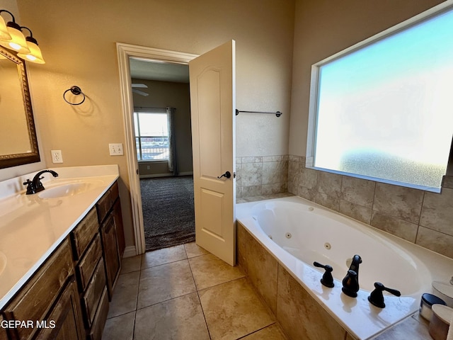 11609 Saint Thomas Way, El Paso, TX 79936 - full bath with a tub with jets, vanity, and tile patterned floors