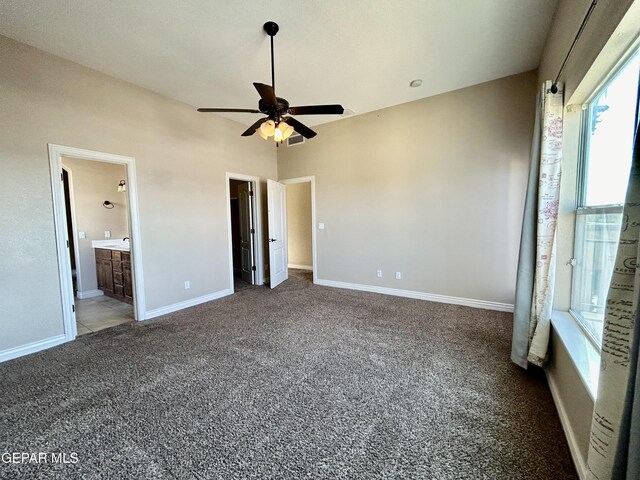 11609 Saint Thomas Way, El Paso, TX 79936 - unfurnished bedroom with carpet, baseboards, ensuite bath, and ceiling fan