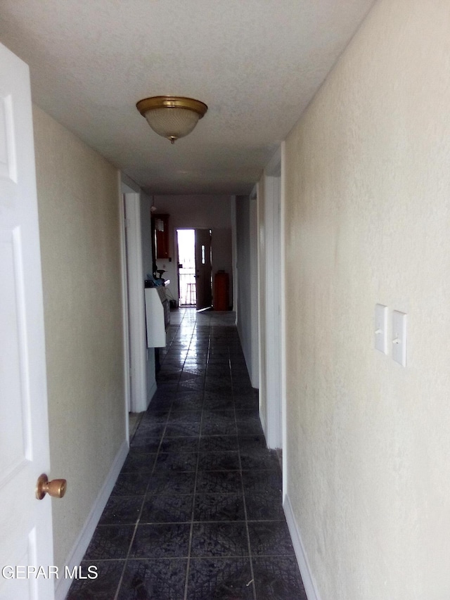929 Coach Rd, Canutillo, TX 79835 - corridor featuring baseboards and tile patterned floors