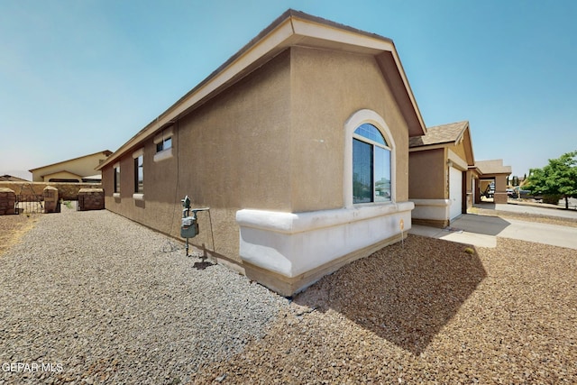 12009 Copper Point Pl, El Paso, TX 79934 - view of home's exterior with stucco siding