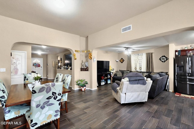 12009 Copper Point Pl, El Paso, TX 79934 - living room featuring arched walkways, dark wood-type flooring, and ceiling fan