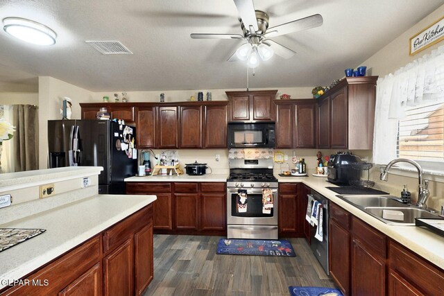 12009 Copper Point Pl, El Paso, TX 79934 - kitchen with black appliances, a sink, light countertops, and ceiling fan