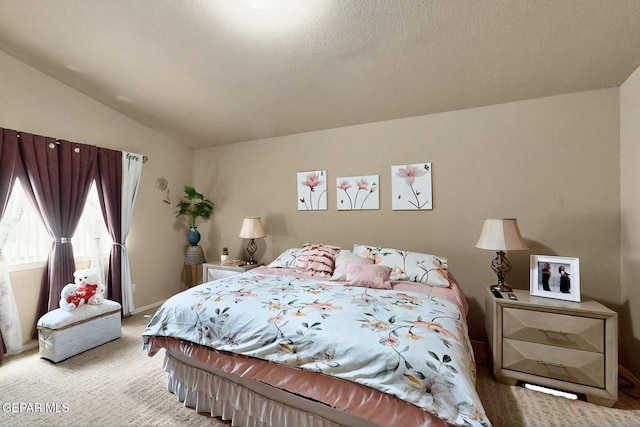 12009 Copper Point Pl, El Paso, TX 79934 - bedroom featuring carpet flooring, vaulted ceiling, and baseboards