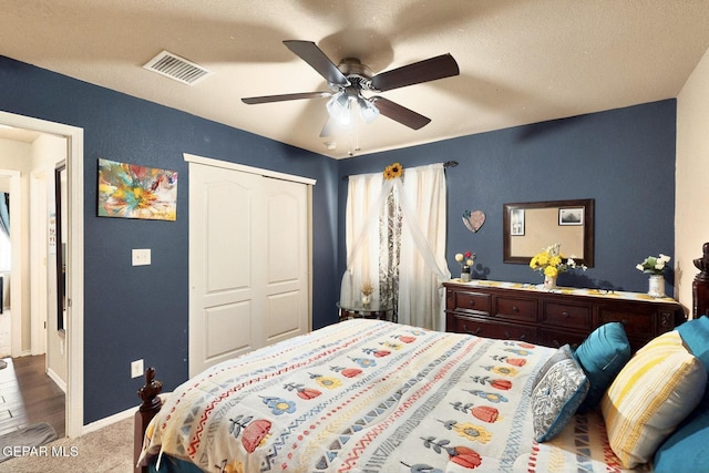 12009 Copper Point Pl, El Paso, TX 79934 - bedroom featuring baseboards, a closet, ceiling fan, and carpet