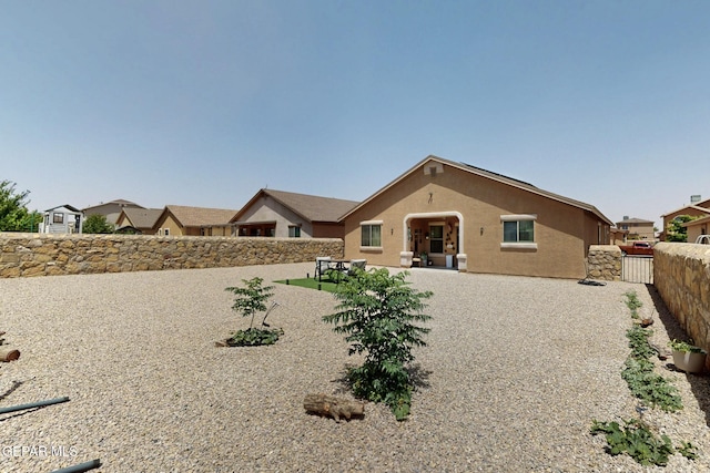 12009 Copper Point Pl, El Paso, TX 79934 - view of front of property with a fenced backyard and stucco siding