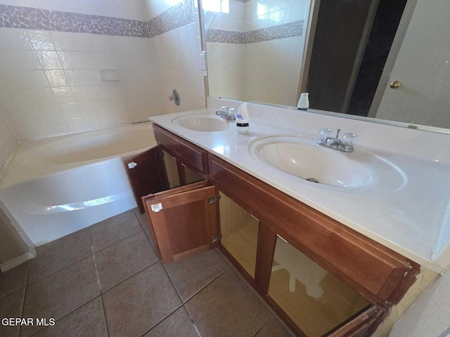 PPP10049 Paloma Dr, El Paso, TX 79924 - bathroom featuring a tub to relax in, double vanity, and tile patterned flooring