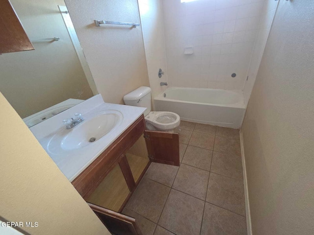 PPP10049 Paloma Dr, El Paso, TX 79924 - full bath featuring tile patterned floors, toilet, vanity, shower / bath combination, and a textured wall