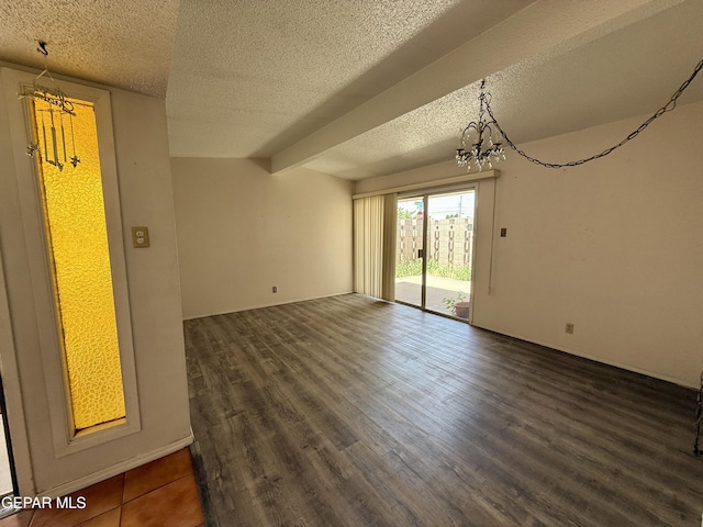 3216 Drumond Rd, El Paso, TX 79925 - spare room featuring a chandelier, a textured ceiling, and dark wood-type flooring