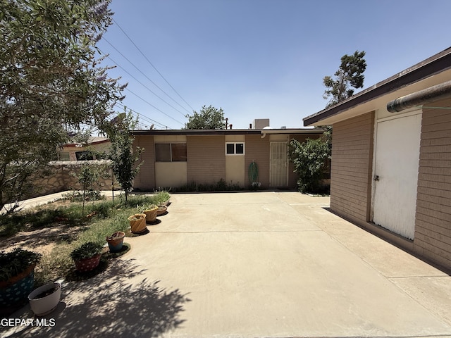 3216 Drumond Rd, El Paso, TX 79925 - view of front of home with a patio and brick siding