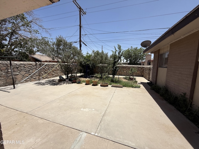 3216 Drumond Rd, El Paso, TX 79925 - fenced backyard with a patio