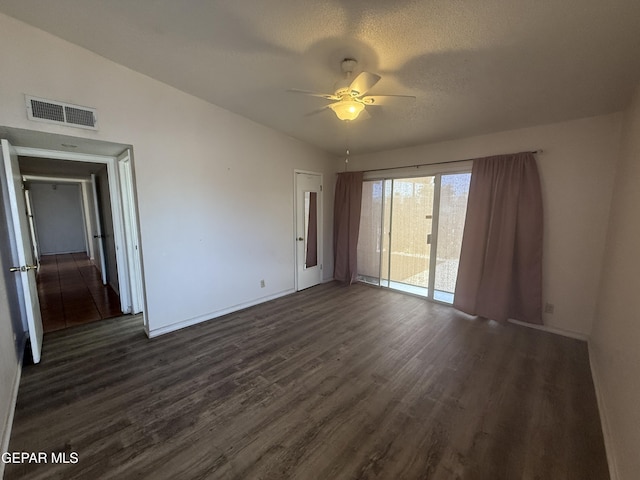 3216 Drumond Rd, El Paso, TX 79925 - spare room with dark wood-style floors, baseboards, and a ceiling fan