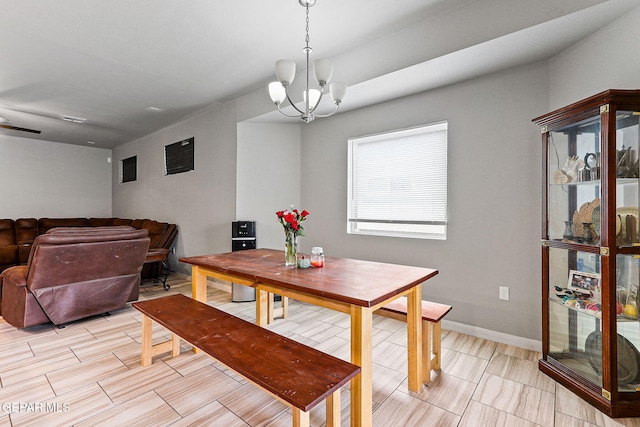 13925 Lago Vista Ave, Horizon City, TX 79928 - dining area with a chandelier and baseboards