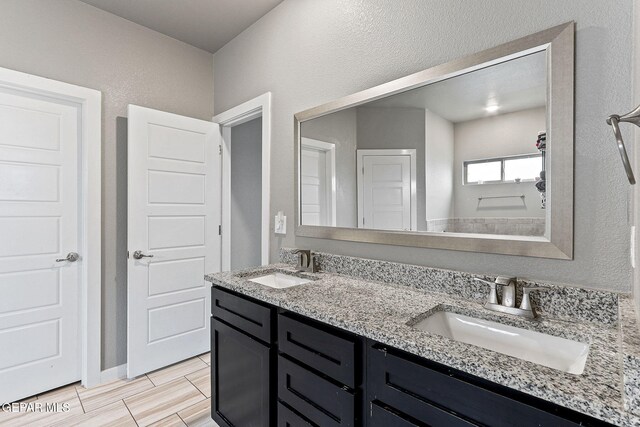 13925 Lago Vista Ave, Horizon City, TX 79928 - bathroom featuring double vanity