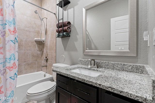 13925 Lago Vista Ave, Horizon City, TX 79928 - bathroom featuring toilet, shower / tub combo with curtain, vanity, and a textured wall