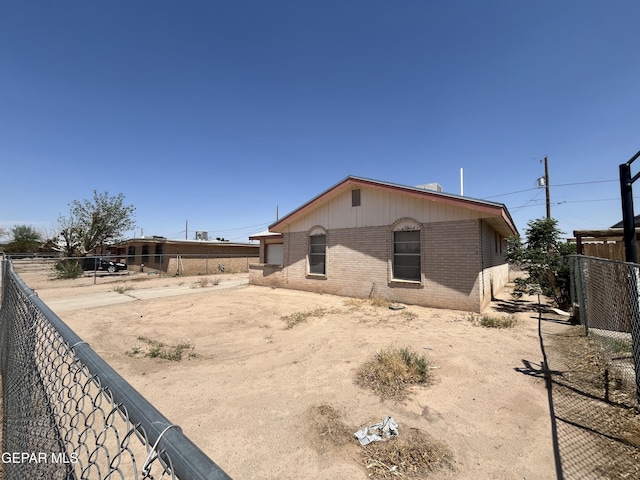 9129 Plymouth Dr, El Paso, TX 79907 - view of front of house with brick siding