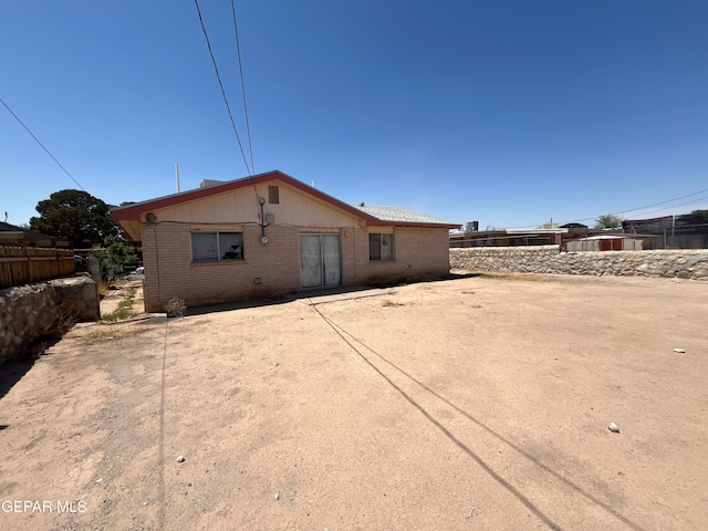 9129 Plymouth Dr, El Paso, TX 79907 - back of house featuring brick siding
