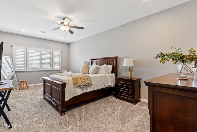 12517 Winners Cir, El Paso, TX 79928 - bedroom featuring light carpet, baseboards, and a ceiling fan
