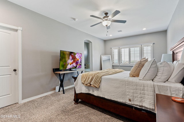 12517 Winners Cir, El Paso, TX 79928 - bedroom with arched walkways, carpet, baseboards, and a ceiling fan