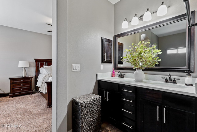 12517 Winners Cir, El Paso, TX 79928 - bathroom with ensuite bathroom and double vanity