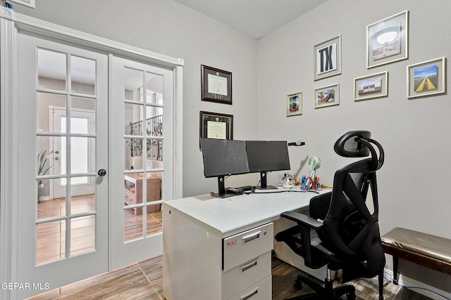 12517 Winners Cir, El Paso, TX 79928 - office with french doors, healthy amount of natural light, and light wood-style flooring