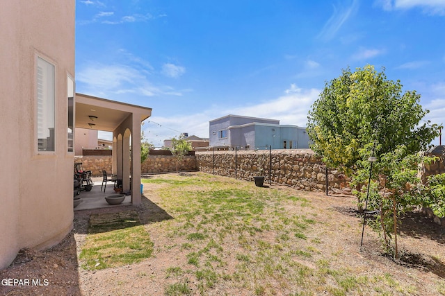 12517 Winners Cir, El Paso, TX 79928 - view of yard with a patio