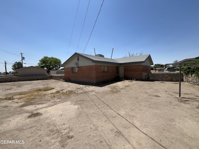 9217 Plymouth Dr, El Paso, TX 79907 - view of home's exterior with brick siding