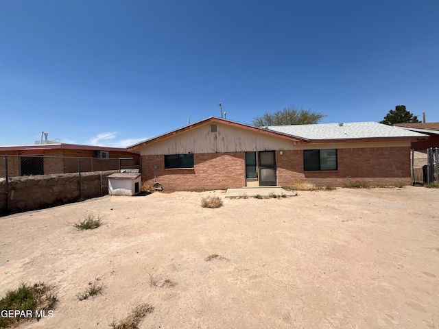 724 Haverhill Rd, El Paso, TX 79907 - rear view of house with brick siding