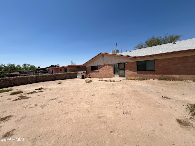 724 Haverhill Rd, El Paso, TX 79907 - back of house featuring brick siding