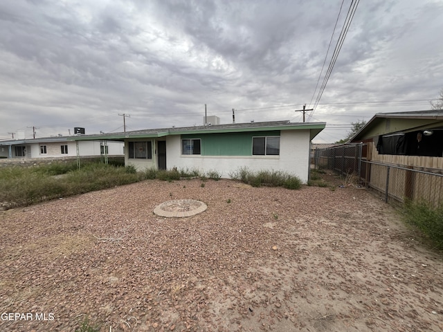 412 Indian Pl, El Paso, TX 79907 - rear view of house featuring brick siding