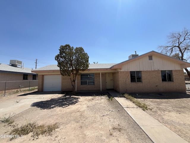 732 Jamestown Rd, El Paso, TX 79907 - single story home with brick siding, driveway, and a garage