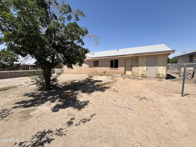 732 Jamestown Rd, El Paso, TX 79907 - rear view of house featuring brick siding