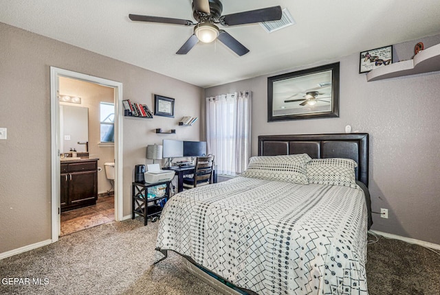 3844 Loma Cortez Dr, El Paso, TX 79938 - carpeted bedroom featuring baseboards, ensuite bathroom, a textured wall, and a ceiling fan