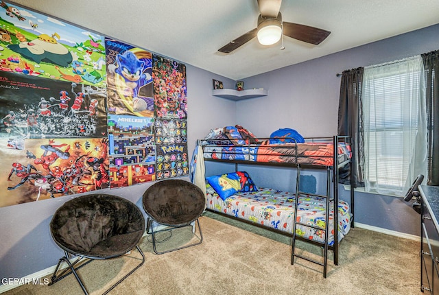 3844 Loma Cortez Dr, El Paso, TX 79938 - carpeted bedroom featuring baseboards and a ceiling fan