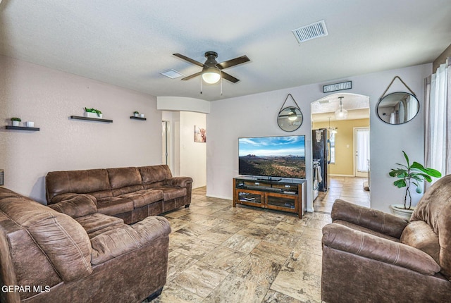 3844 Loma Cortez Dr, El Paso, TX 79938 - living area featuring a ceiling fan and arched walkways