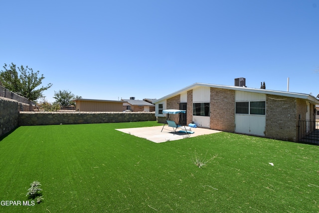 10824 Obsidian St, El Paso, TX 79924 - view of yard with a patio area and central AC unit