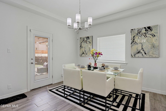 12816 Linstead Ave, El Paso, TX 79928 - dining area featuring a chandelier, healthy amount of natural light, baseboards, and wood finished floors