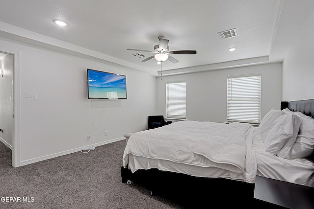 12816 Linstead Ave, El Paso, TX 79928 - bedroom with a raised ceiling, dark colored carpet, baseboards, recessed lighting, and a ceiling fan